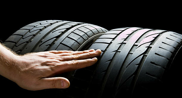 Checking And Compare New And Worn Tires